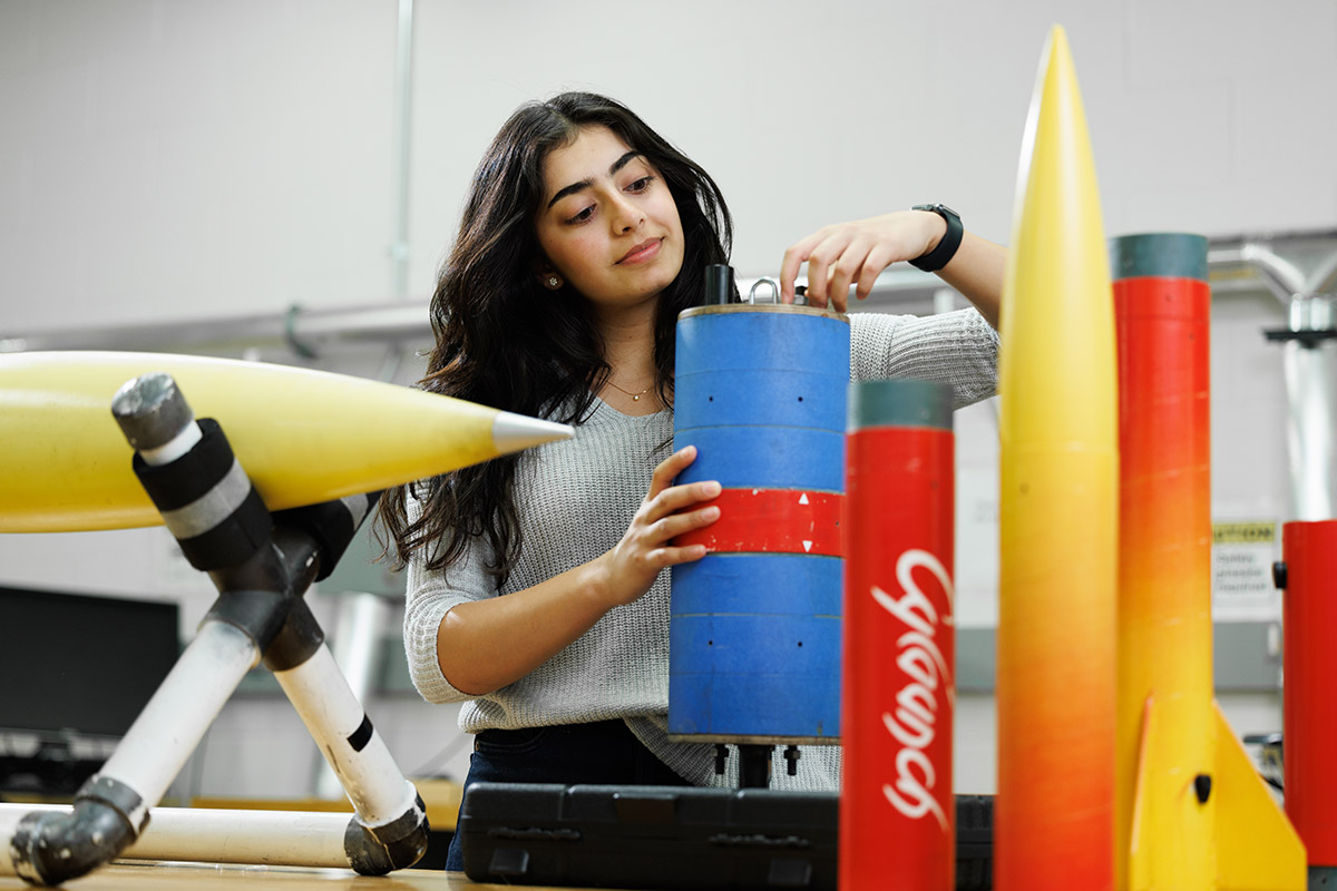 student with rockets