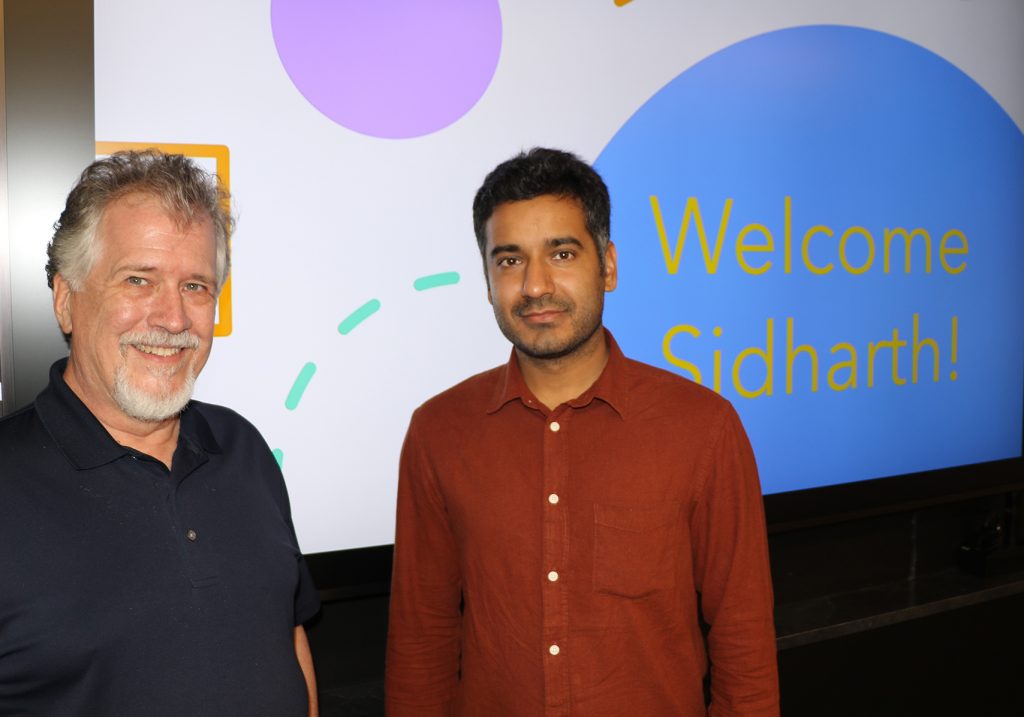 Sidharth with Vance and Arlene Coffman Endowed Department Chair Alric Rothmayer at his department welcome reception.