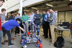 Students demonstrating MAVRIC Mars Rover