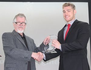 Noah Hamblen receives paque