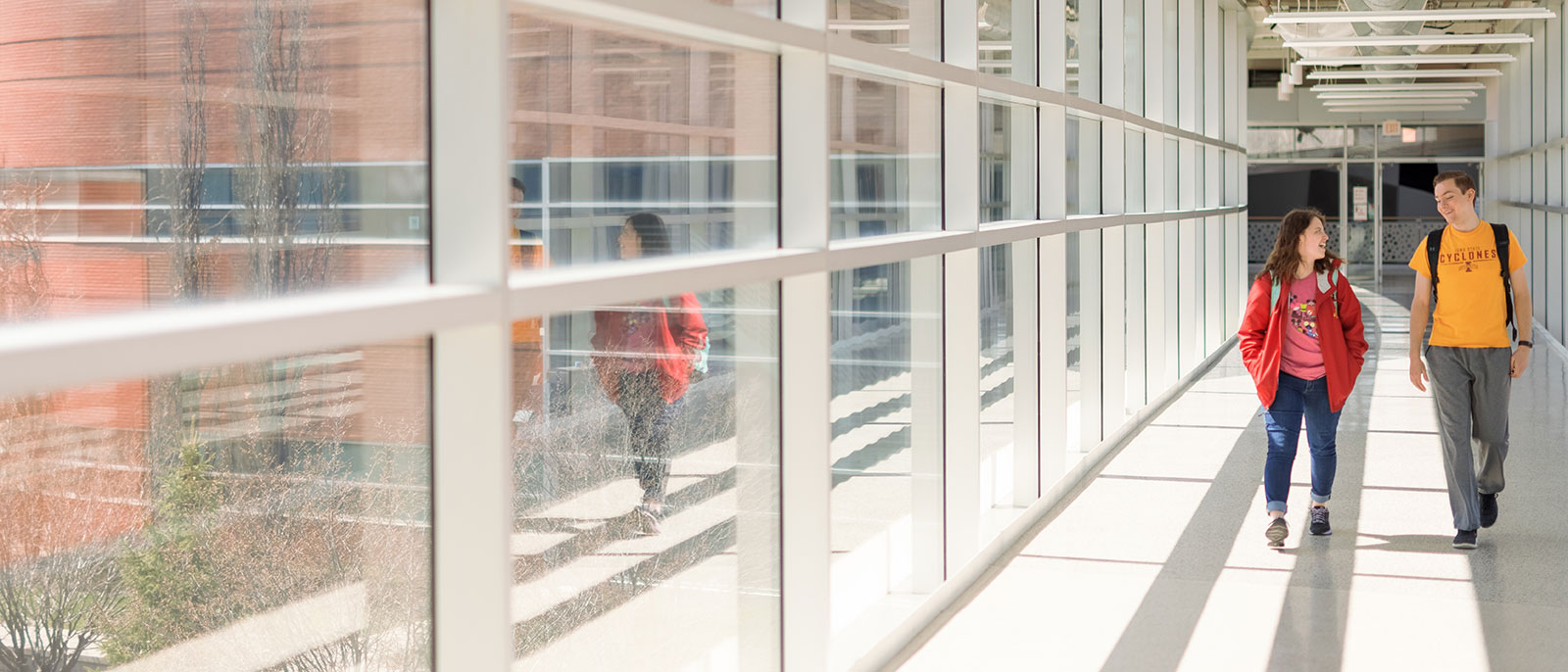 students in skywalk